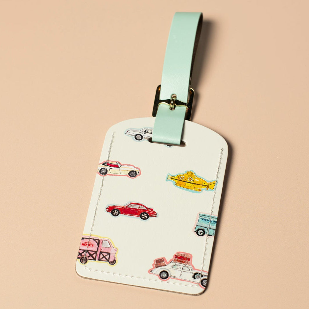 Luggage tag with car illustrations on a beige background