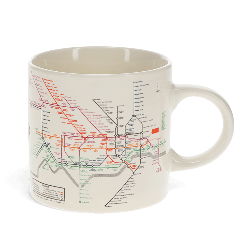 A ceramic mug with a white background featuring a vintage print of London's underground map in colorful lines.