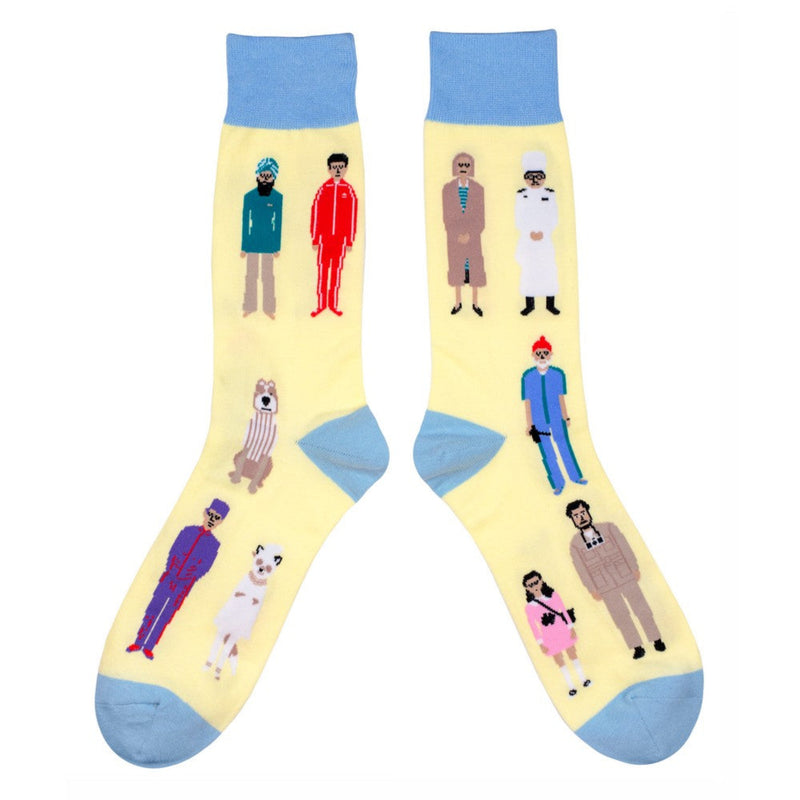 Yellow socks with cartoon Wes Anderson characters on a white background
