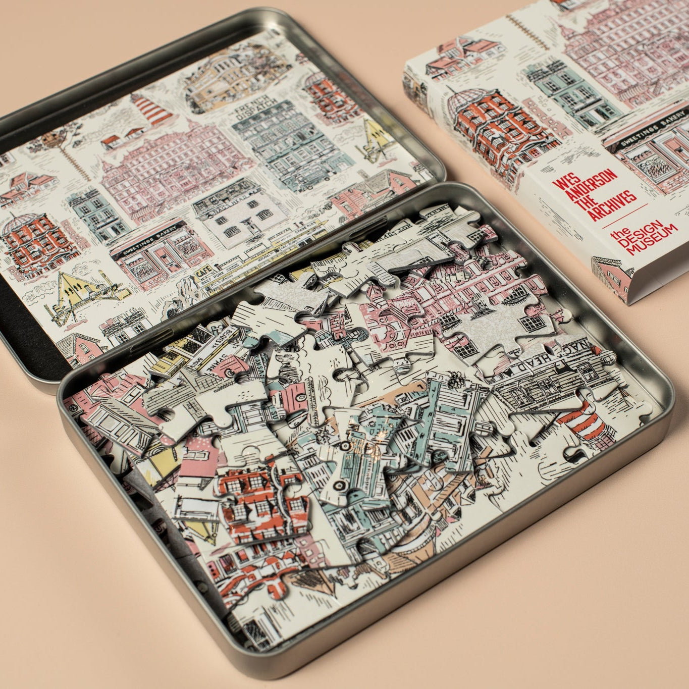 Puzzle pieces and packaging on a beige background