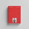 Red book titled 'Wes Anderson The Archives' with a small photo of a person on a gray background