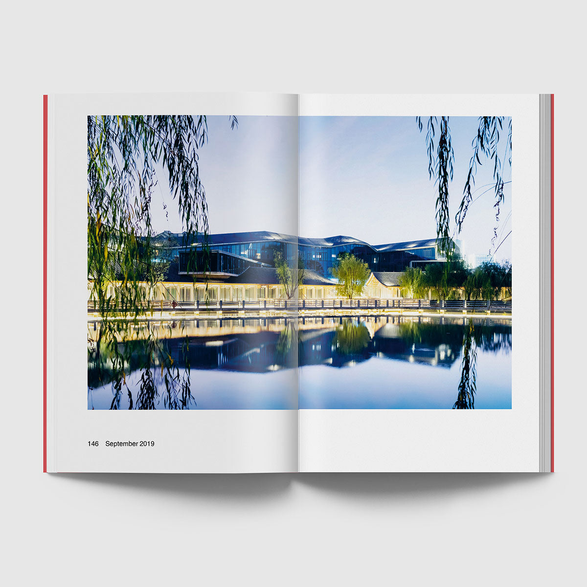 Open page featuring a building on a lake side
