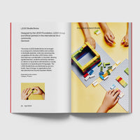 Open page featuring lego braille bricks on yellow background with black text