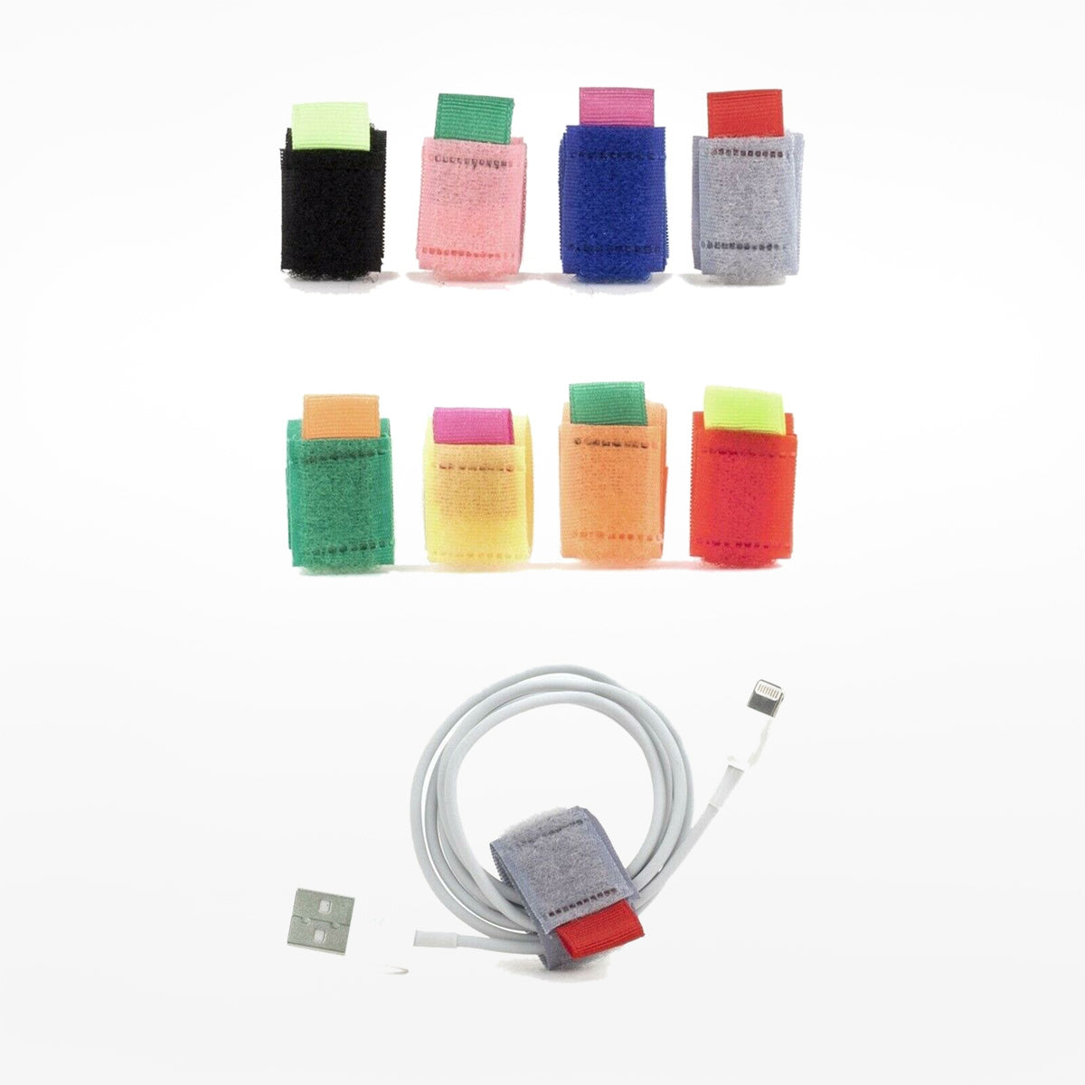 Colourful velcro cable ties and cable on a white background