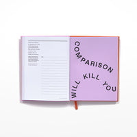 Open journal page with 'comparison will kill you' in bold black letters agains a lilac background
