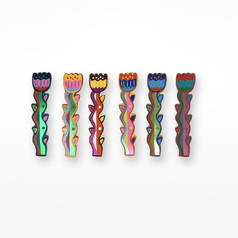 Colourful leather tulip shaped bookmarks on a white background. 